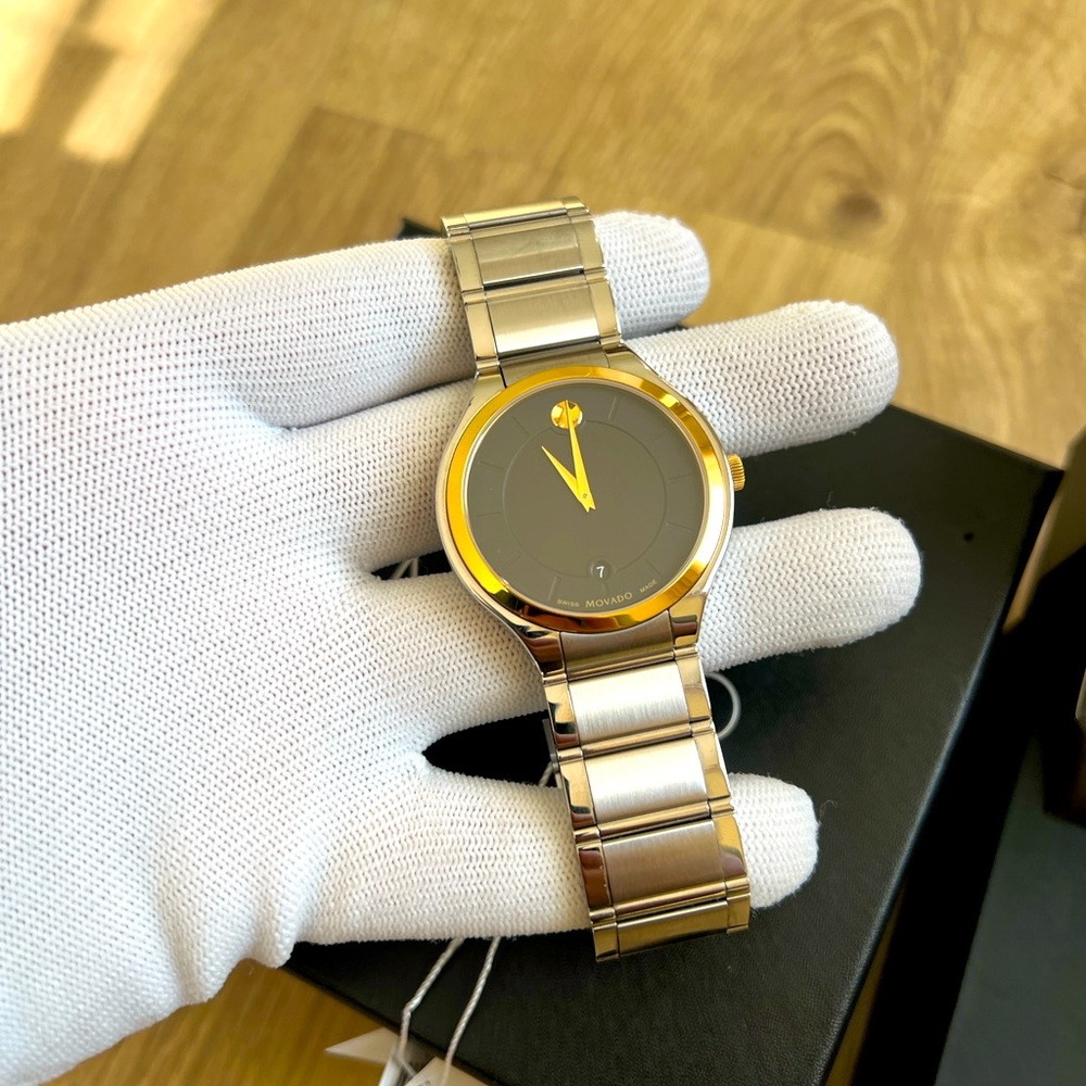 Movado Quadro Watch With 40mm Black Face & Silver Bracelet with gold bezel